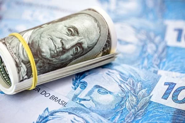 Aprovação da reforma tributária derruba dólar e faz bolsa subir