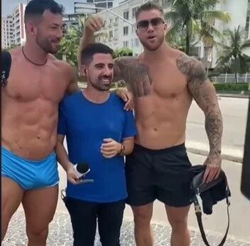 Atores pornôs gigantes atrapalham repórter da Globo durante gravação