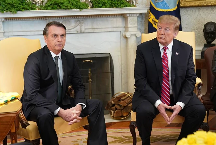 Donald Trump pode visitar Jair Bolsonaro no Brasil, diz colunista